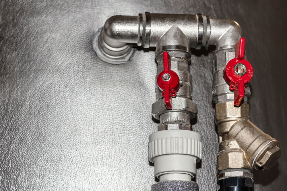 Valves,On,Pipes,Of,Water,Heating,System,Of,House,In