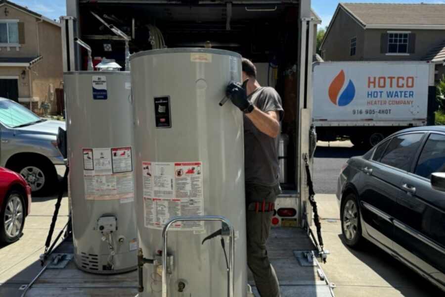 HOTCO Technician Moving Water Heaters in Newcastle, CA